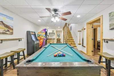 Emory House large cabin game room with pool table and arcade games