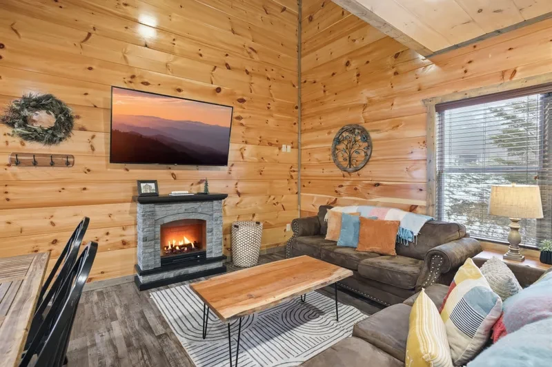 living room with fireplace in Smoky Blue Haven cabin