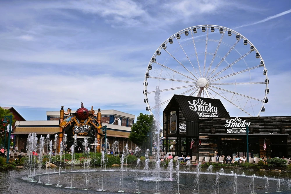 The Island Show Fountain in front of Ole Smoky, SkyFly: Soar America, and The Great Smoky Mountain Wheel